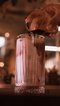 A steaming cup of coffee on the tableの写真素材