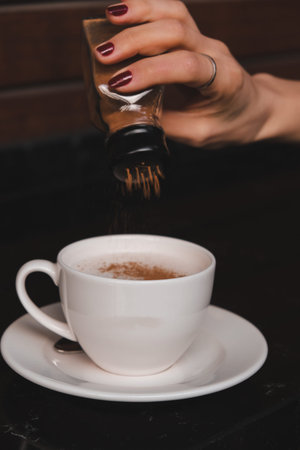 A steaming cup of coffee on the table