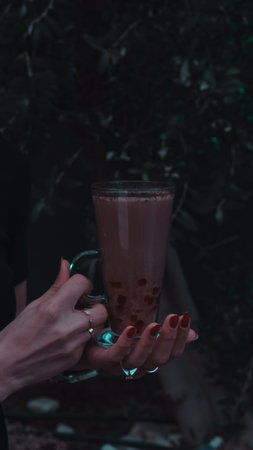 A cozy corner with a steaming cup of coffeeの写真素材