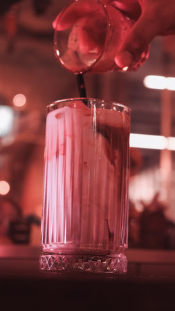 A steaming cup of coffee on the tableの写真素材