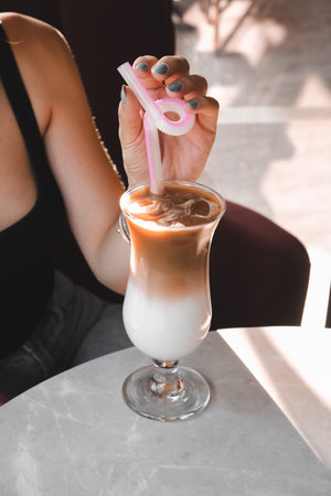 A cozy corner with a steaming cup of coffeeの写真素材