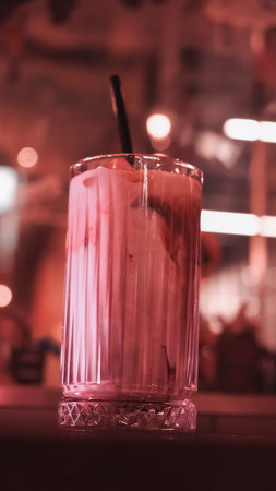 A steaming cup of coffee on the tableの写真素材