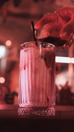 A steaming cup of coffee on the tableの写真素材