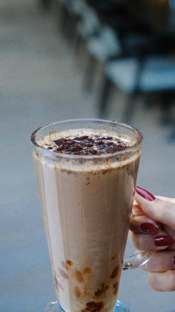 A cozy corner with a steaming cup of coffeeの写真素材