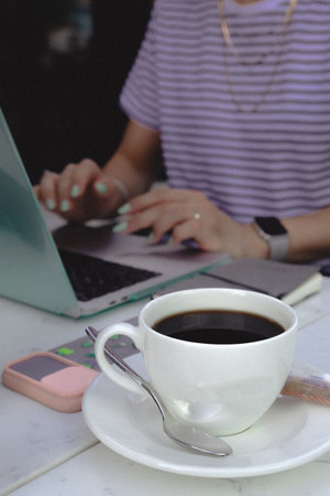 Relaxing coffee break with a hot drinkの写真素材