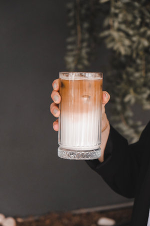 A cozy corner with a steaming cup of coffeeの写真素材