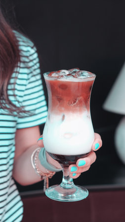 Freshly brewed coffee served in a stylish cupの写真素材