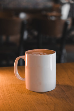 Freshly brewed coffee served in a stylish cupの写真素材