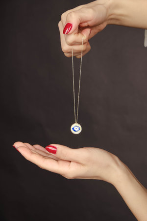 Beautiful golden jewelry with precious stones and diamondsの写真素材