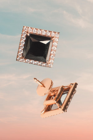 Beautiful golden jewelery with precious stones and diamondsの写真素材