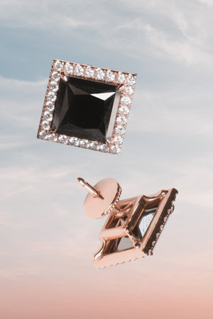 Beautiful golden jewelery with precious stones and diamondsの写真素材