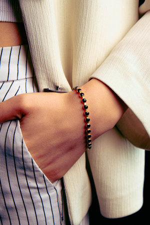 Beautiful golden jewelery with precious stones and diamonds