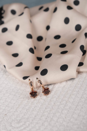 stylish jewelry like silver, gold, diamonds, precious stones.