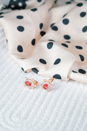 Beautiful golden jewelery with precious stones and diamondsの写真素材