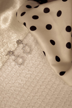 stylish jewelry like silver, gold, diamonds, precious stones.