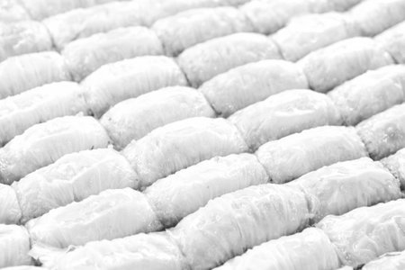 Baklava with Honey Drizzle and Crushed Nutsの写真素材