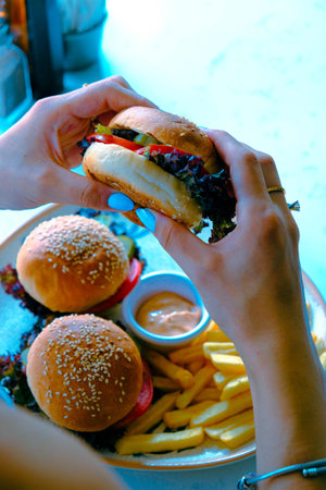 Homemade hamburger with fresh vegetables