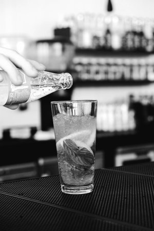 Cocktail glasses filled with vibrant, colorful drinksの写真素材