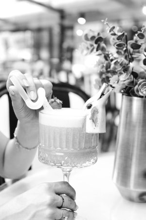 Colorful cocktails served in elegant glassesの写真素材