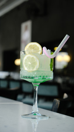 Colorful cocktails served in elegant glassesの写真素材