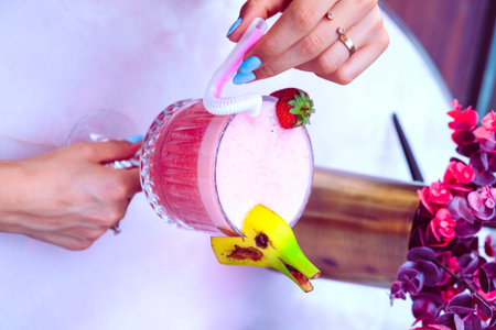 Colorful cocktails served in elegant glassesの写真素材