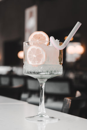 Cocktail glasses filled with vibrant, colorful drinksの写真素材