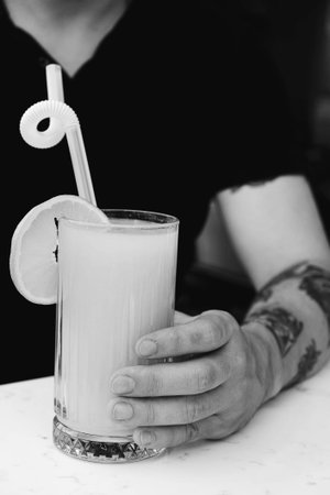 Colorful cocktail served in an elegant glassの写真素材