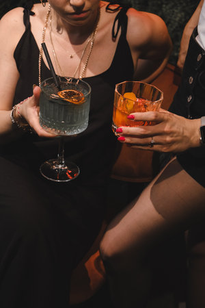 Colorful cocktails served in elegant glassesの写真素材
