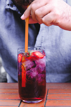 Colorful cocktail served in elegant glassの写真素材