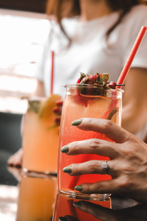 Colorful cocktails served in elegant glassesの写真素材