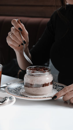 Very delicious dessert in jars, sweet and cakes in jarsの写真素材