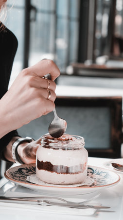 Very delicious dessert in jars, sweet and cakes in jarsの写真素材