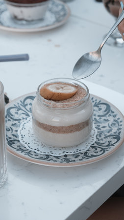 Very delicious dessert in jars, sweet and cakes in jarsの写真素材