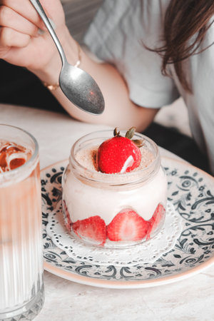 Delicious dessert in jars, sweet and cakes in jarsの写真素材