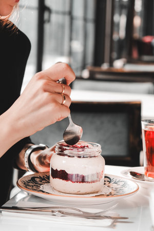 Very delicious dessert in jars, sweet and cakes in jarsの写真素材