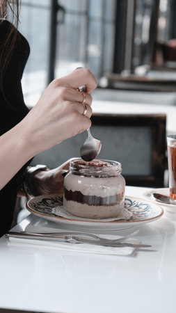 Very delicious dessert in jars, sweet and cakes in jarsの写真素材