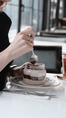 Very delicious dessert in jars, sweet and cakes in jarsの写真素材