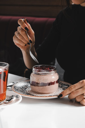 Very delicious dessert in jars, sweet and cakes in jarsの写真素材