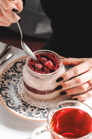 Very delicious dessert in jars, sweet and cakes in jarsの写真素材