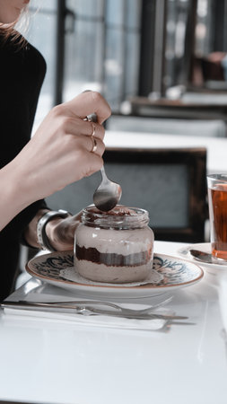 Very delicious dessert in jars, sweet and cakes in jarsの写真素材