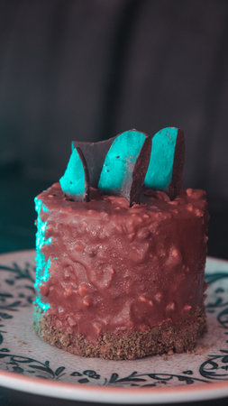 Elegant Layered Cake on a Wooden Tableの写真素材