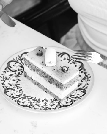 Elegant Layered Cake on a Rustic Wooden Table