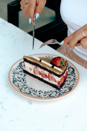 "Layered Cake Slice on a Fancy Plate"の写真素材