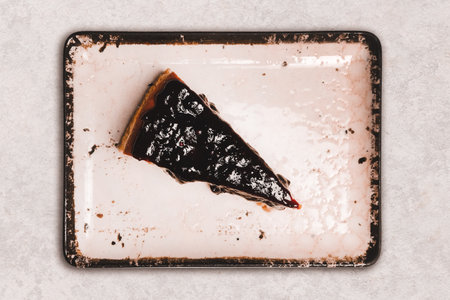 Layered Cake on a Rustic Wooden Tableの写真素材