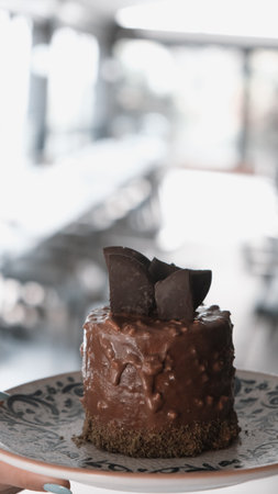 Chocolate Drip Cake with Berries and Flowersの写真素材