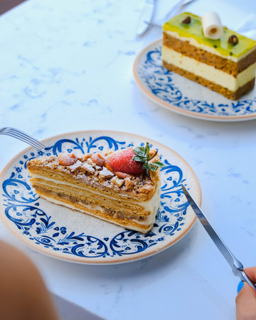 Colorful Fruit Topped Cake on White Background