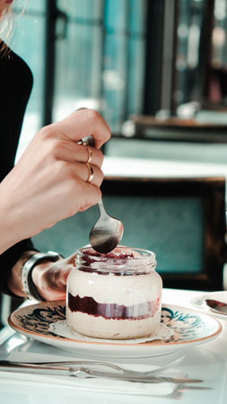 Very delicious dessert in jars, sweet and cakes in jarsの写真素材