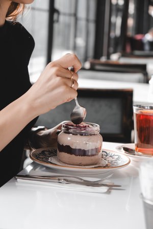 Very delicious dessert in jars, sweet and cakes in jarsの写真素材