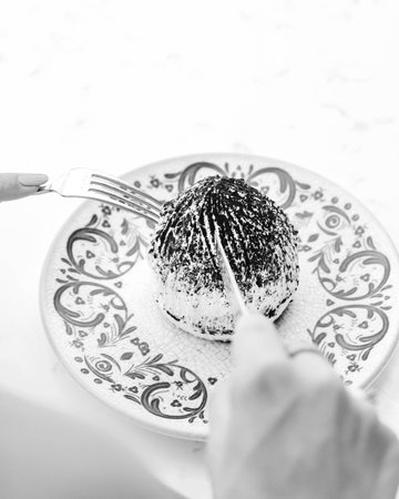 Layered Cake on a Rustic Wooden Tableの写真素材