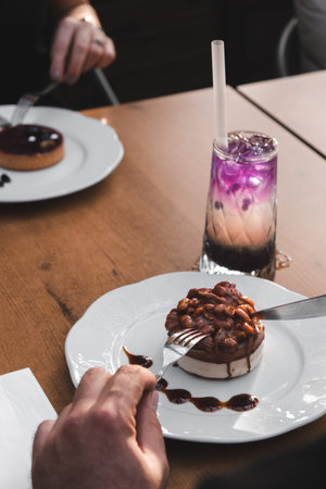 Elegant Layered Cake on a Rustic Wooden Table